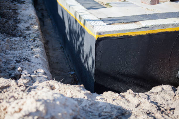 Professional Waterproofing technician working in Embarrass, WI